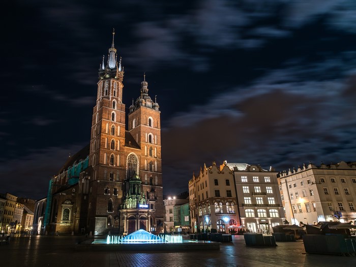 St. Mary's Basilica and buildings at night in Krakow