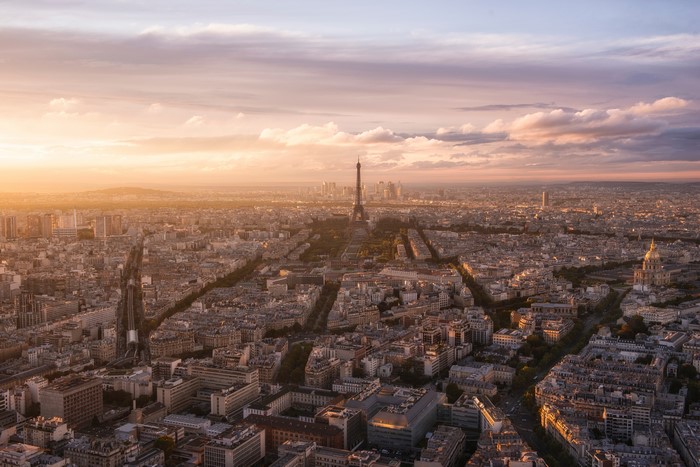 Aerial view of Paris with Eiffel Tower at sunset
