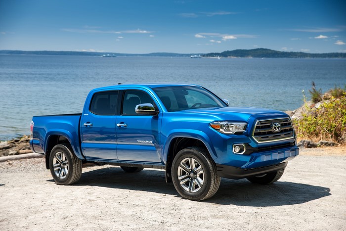 Blue Toyota Tacoma Limited Truck by the Water
