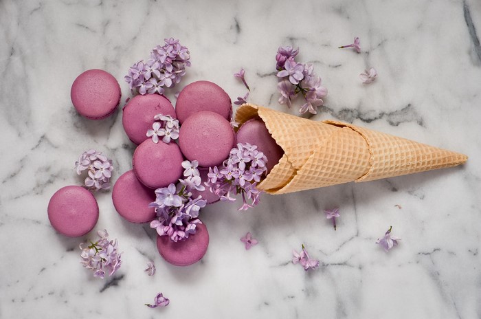 Purple Macarons and Lilac Flowers in an Ice Cream Cone
