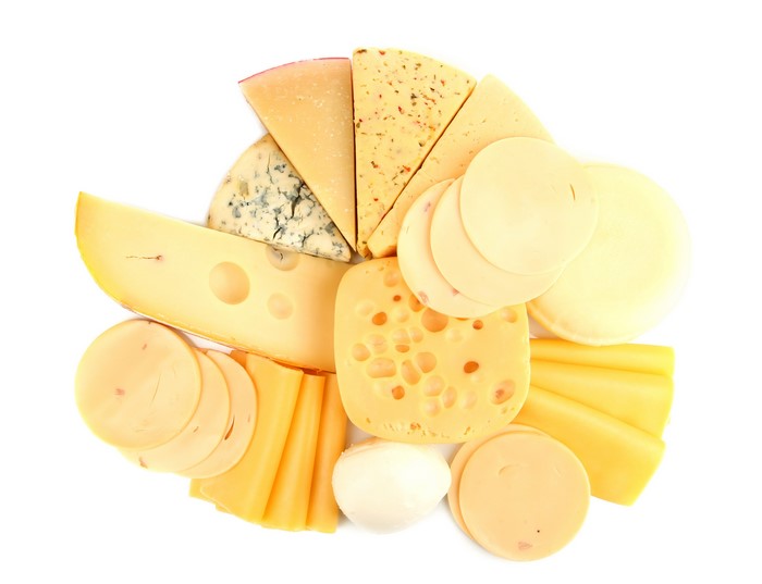 Assortment of Cheeses on White Background
