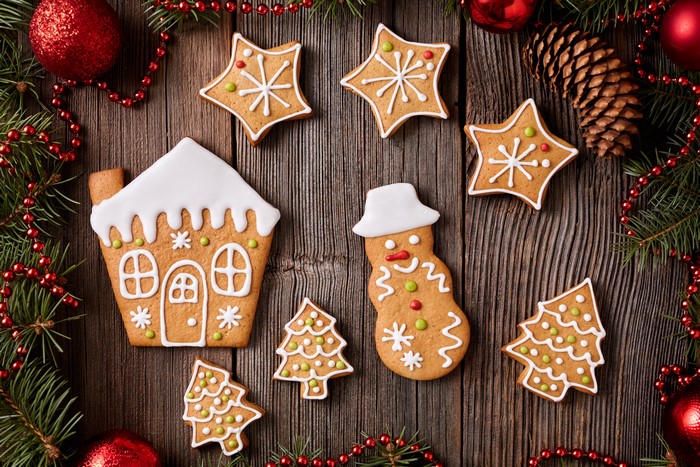Christmas gingerbread cookies on wooden background
