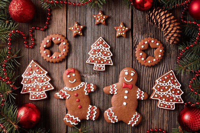 Christmas gingerbread cookies on wooden background