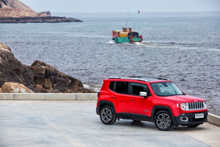 Red Jeep Renegade Limited by the Sea