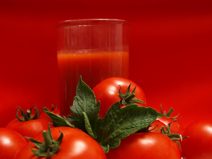 Tomatoes and Tomato Juice in a Highball Glass
