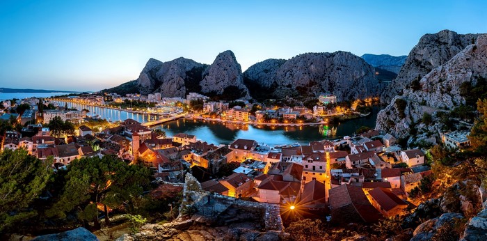 Omis, Croatia at dusk with mountains and river