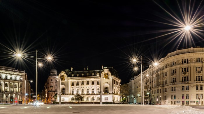 Vienna street at night with buildings and street lights