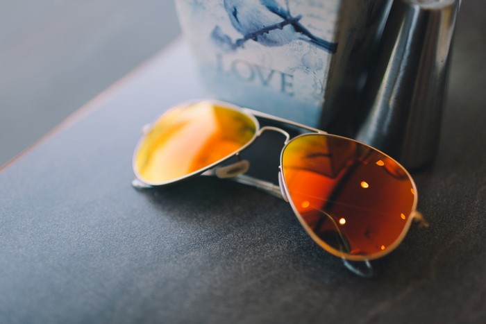 Aviator sunglasses with orange lenses
