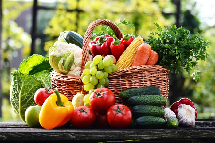 Vegetables and fruits in a wicker basket