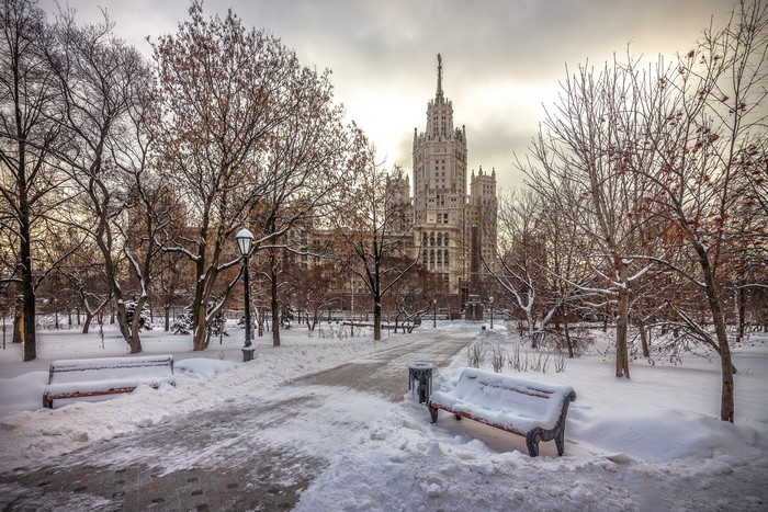 Winter park in Moscow with Stalinist skyscraper