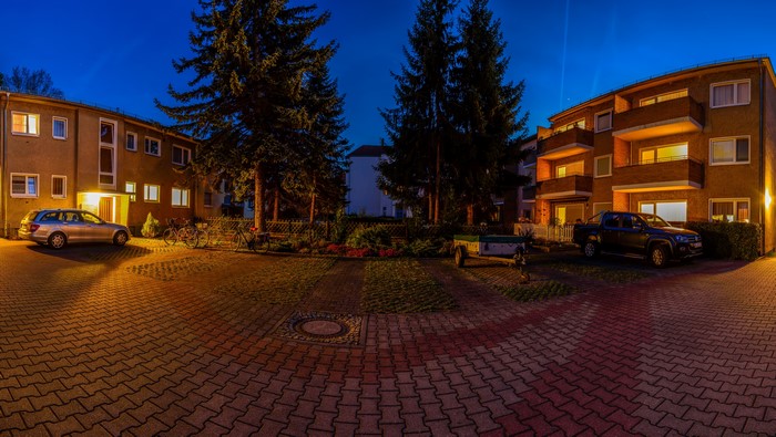 Apartment buildings and cars at night in Germany