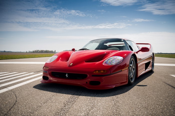 Red Ferrari F50 on a Racetrack