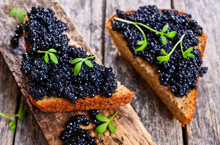 Caviar on bread with microgreens