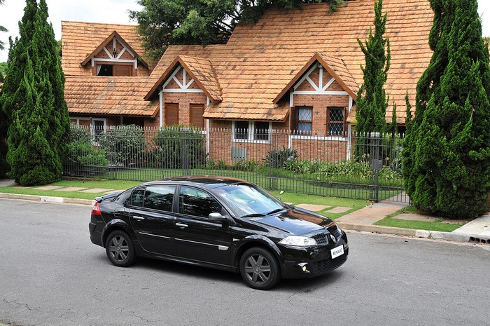 Black Renault Megane Extreme sedan on a street