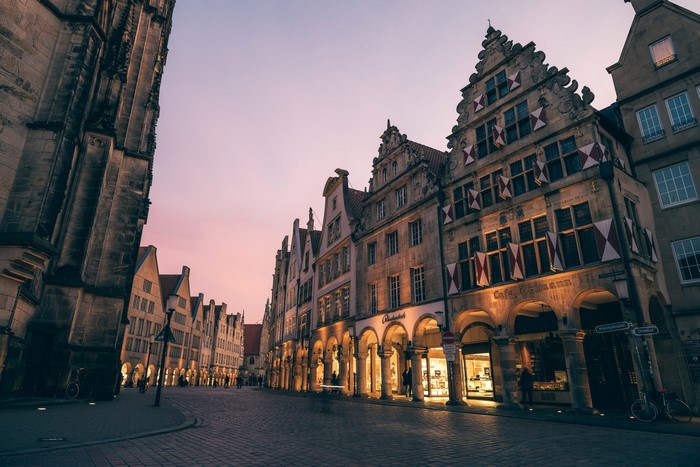 Historic buildings on a street in Germany at dusk