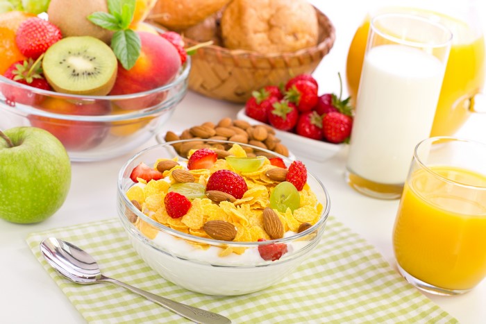 Breakfast with Cereal, Fruit, Juice, and Milk