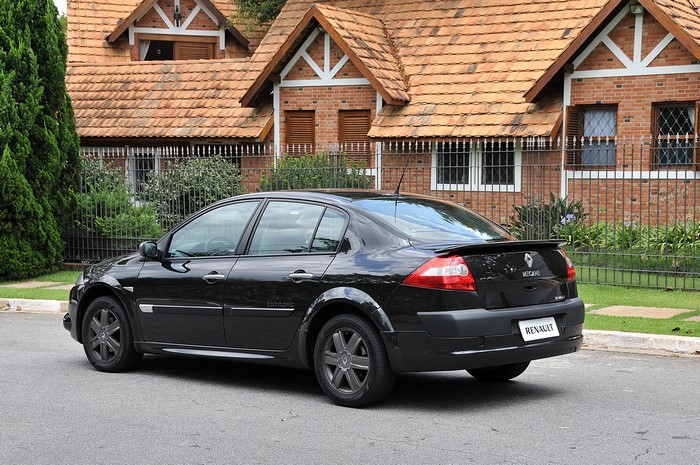 Black Renault Megane Extreme sedan parked on street