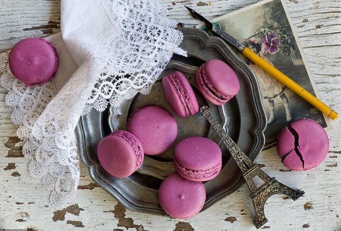 Purple Macarons on a Plate with Eiffel Tower Figurine