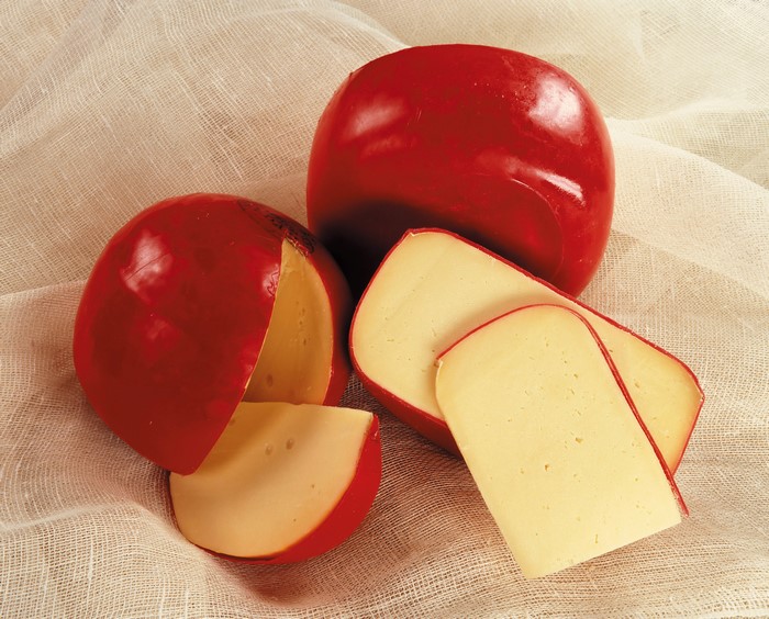 Red Wax Cheese Wheels and Slices