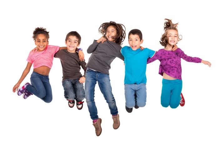 Children Jumping in Jeans on White Background