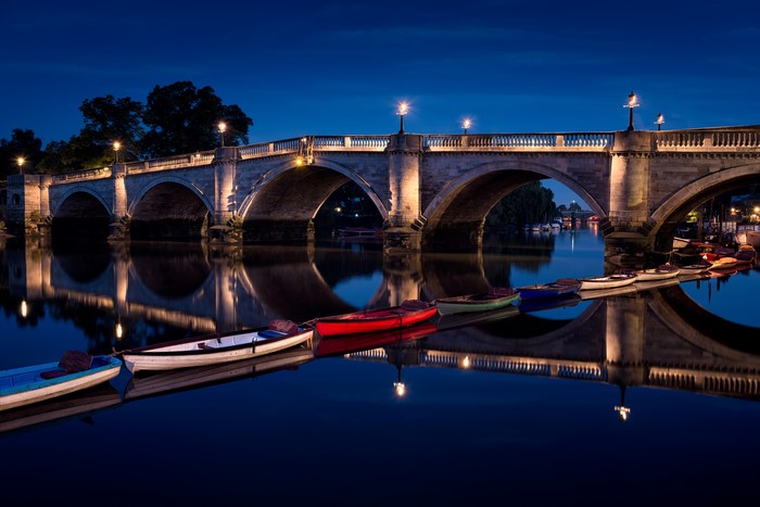 Richmond Bridge at Night with Boats on River Thames