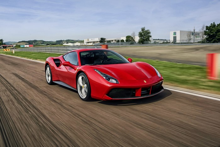 Red Ferrari 488 GTB on a Racetrack