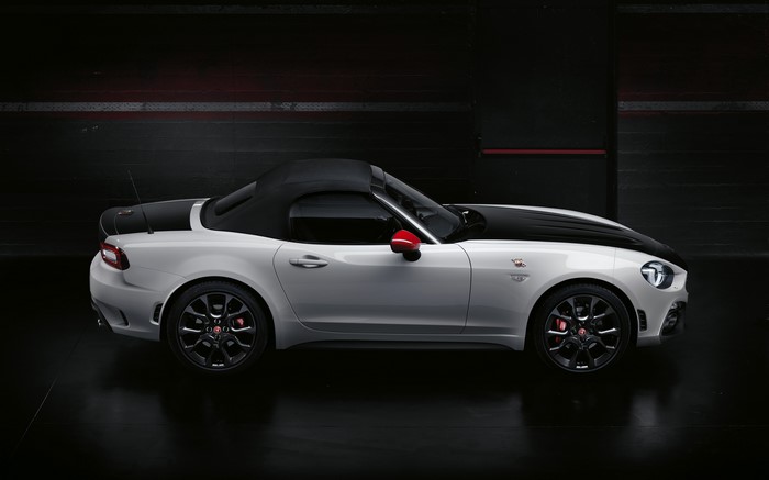 White Abarth 124 Spider convertible with black accents