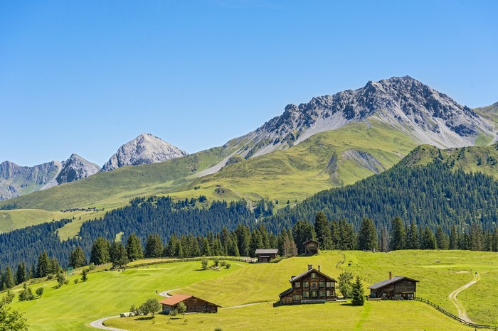4K Jakobshorn Davos Switzerland Mountains Houses Forests Grasslands