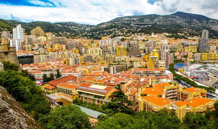 Panoramic view of Monaco cityscape with mountains