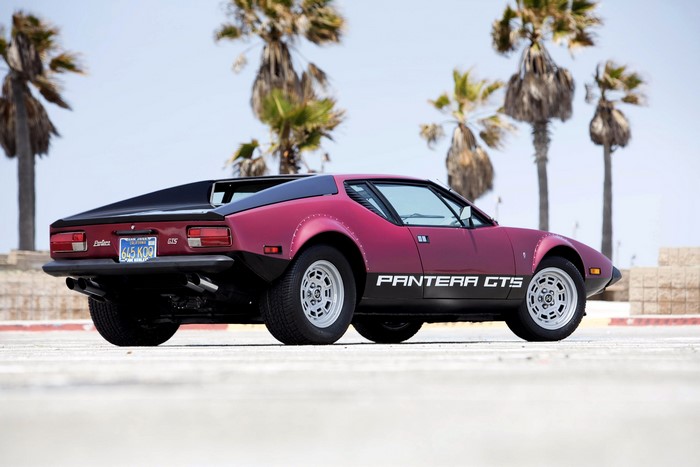 1974 De Tomaso Pantera GTS parked by palm trees
