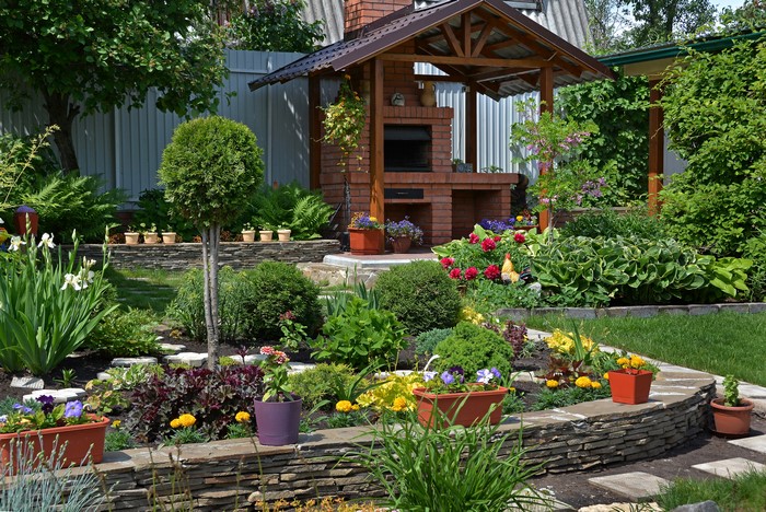 Beautifully landscaped garden with brick barbecue