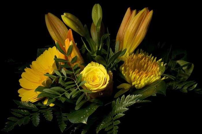 Yellow flowers bouquet with lilies, roses, and gerberas