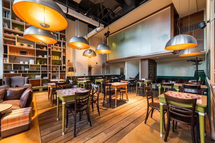 Cafe interior with tables and chairs