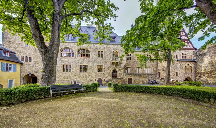 Burg Alzey Castle in Germany with trees and bench