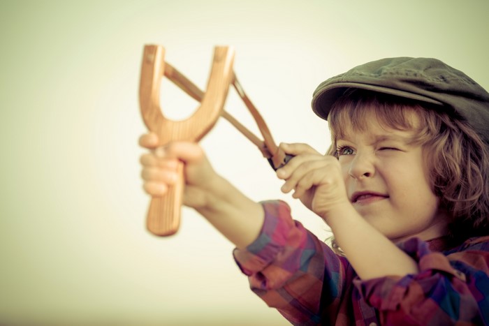 Boy with a slingshot