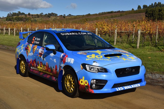 Blue Subaru WRX STI rally car with hot air balloon graphics