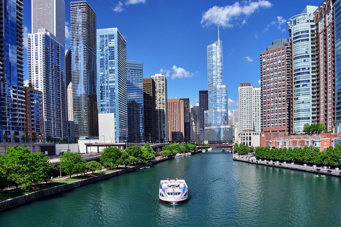 Chicago City Skyscrapers and River with Boat