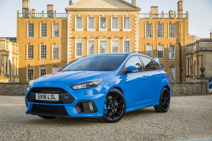 Blue 2016 Ford Focus RS parked in front of a building