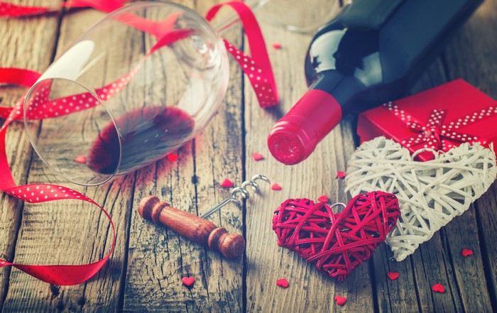 Valentine's Day wine bottle, glass, and hearts