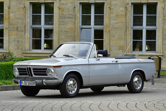 BMW 1600-2 Cabriolet parked in front of a building