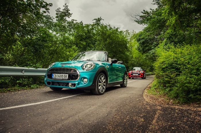 Two Mini Cooper Cabrio F57 cars on a road