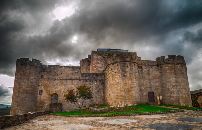 Castillo Sanabria fortress under a cloudy sky