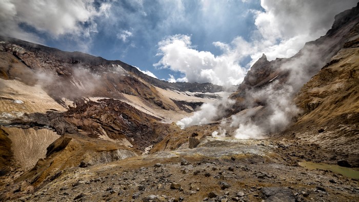 Volcanic landscape with steam on Kamchatka Peninsula, Russia