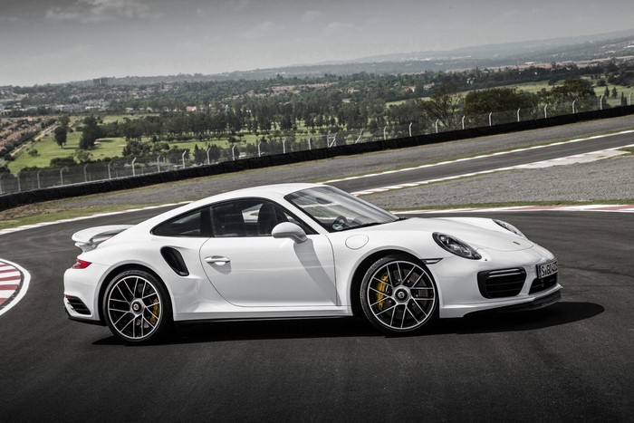 White Porsche 911 Turbo S Coupe on a Racetrack