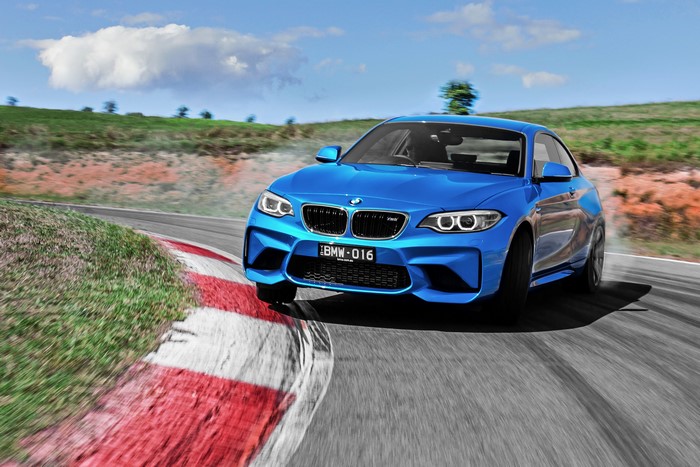 Blue BMW M2 F87 Coupe on a Race Track