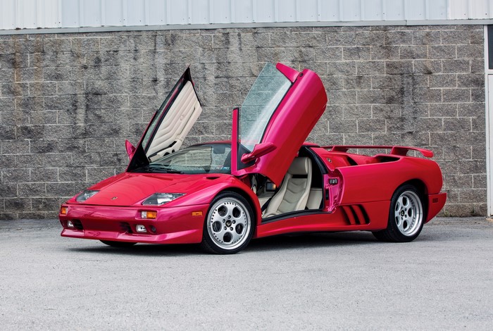 Red Lamborghini Diablo VT Roadster with Doors Open