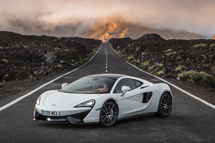 White McLaren 570GT on a Road