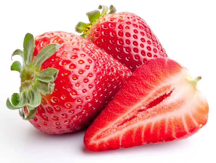 Three Strawberries, One Halved, White Background