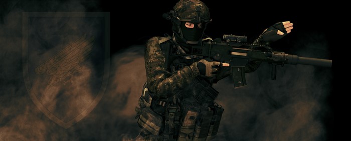Soldier with assault rifle and German Special Forces emblem