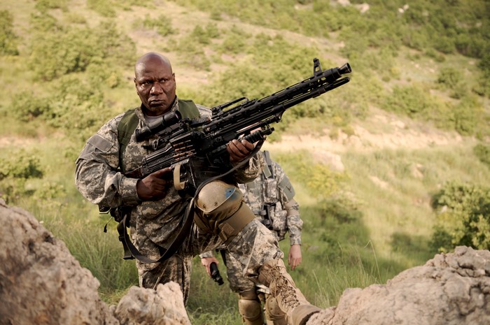 Ving Rhames with a machine gun